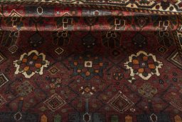 Full view of 1970s Shiraz rug from Iran / Persia, 146 × 117 cm in Red tones