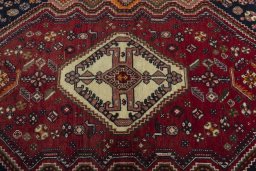 Central medallion detail of 2000s Shiraz rug from Iran / Persia