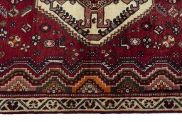 Full view of 2000s Shiraz rug from Iran / Persia, 183 × 90 cm in Red tones