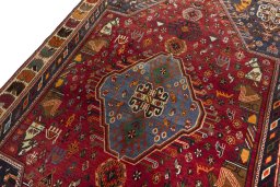 Backside of handmade 2000s Shiraz rug showing knot structure and weave density