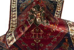 Surface texture of 2000s Shiraz rug with natural Wool and intricate pattern