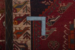 Backside of handmade 2000s Shiraz rug showing knot structure and weave density