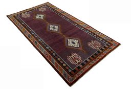 Close-up detail of 1970s Shiraz rug from Iran / Persia showing Wool weave
