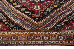 Corner detail of 1970s Shiraz rug showing border pattern and Wool pile