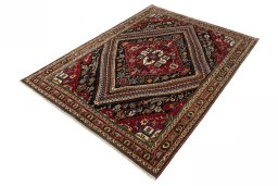 Corner detail of 1970s Shiraz rug showing border pattern and Wool pile