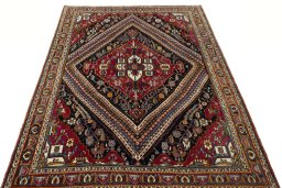 Surface texture of 1970s Shiraz rug with natural Wool and intricate pattern