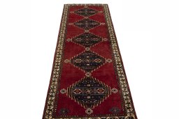 Surface texture of 2000s Shiraz rug with natural Wool and intricate pattern