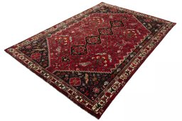 Corner detail of 1970s Shiraz rug showing border pattern and Wool pile
