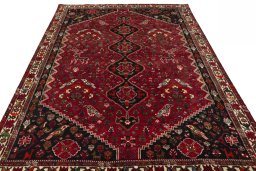Surface texture of 1970s Shiraz rug with natural Wool and intricate pattern