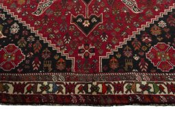 Close-up detail of 1970s Shiraz rug from Iran / Persia showing Wool weave