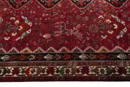 Full view of 1970s Shiraz rug from Iran / Persia, 315 × 222 cm in Red tones