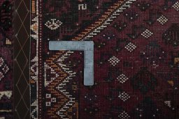 Surface texture of 2000s Shiraz rug with natural Wool and intricate pattern