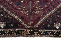 Close-up detail of 2000s Shiraz rug from Iran / Persia showing Wool weave