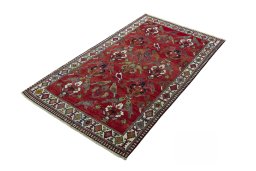 Corner detail of 2000s Shiraz rug showing border pattern and Wool pile