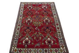 Surface texture of 2000s Shiraz rug with natural Wool and intricate pattern