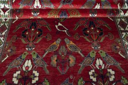 Full view of 2000s Shiraz rug from Iran / Persia, 243 × 140 cm in Red tones