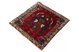 Corner detail of 2000s Shiraz rug showing border pattern and Wool pile
