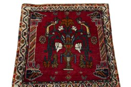Surface texture of 2000s Shiraz rug with natural Wool and intricate pattern