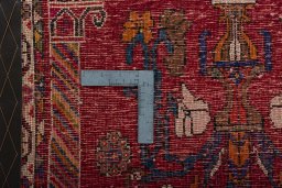 Backside of handmade 2000s Shiraz rug showing knot structure and weave density