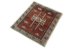 Corner detail of 2000s Shiraz rug showing border pattern and Wool pile