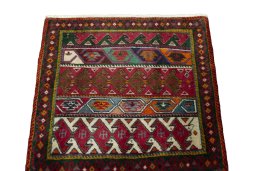 Surface texture of 2000s Shiraz rug with natural Wool and intricate pattern
