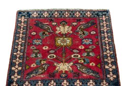 Surface texture of 2000s Shiraz rug with natural Wool and intricate pattern