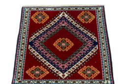 Surface texture of 2000s Shiraz rug with natural Wool and intricate pattern
