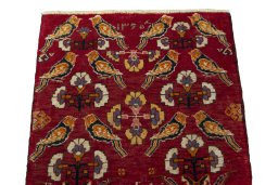Surface texture of 2000s Shiraz rug with natural Wool and intricate pattern
