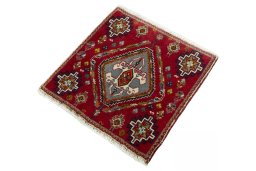 Corner detail of 2000s Shiraz rug showing border pattern and Wool pile