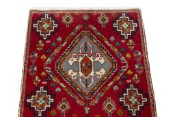 Surface texture of 2000s Shiraz rug with natural Wool and intricate pattern