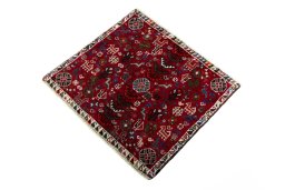 Corner detail of 2000s Shiraz rug showing border pattern and Wool pile