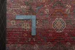 Backside of handmade 2000s Shiraz rug showing knot structure and weave density