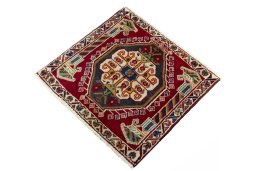 Corner detail of 2000s Shiraz rug showing border pattern and Wool pile
