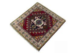 Corner detail of 2000s Shiraz rug showing border pattern and Wool pile