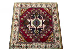 Surface texture of 2000s Shiraz rug with natural Wool and intricate pattern