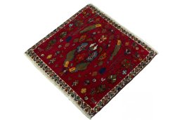 Corner detail of 2000s Shiraz rug showing border pattern and Wool pile