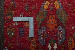 Backside of handmade 2000s Shiraz rug showing knot structure and weave density