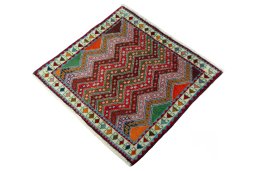Corner detail of 2000s Shiraz rug showing border pattern and Wool pile