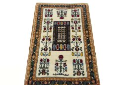 Surface texture of 2000s Shiraz rug with natural Wool and intricate pattern