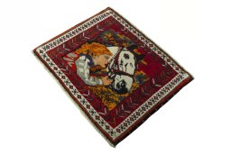 Corner detail of 2000s Shiraz rug showing border pattern and Wool pile