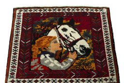 Surface texture of 2000s Shiraz rug with natural Wool and intricate pattern