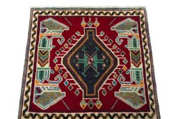 Surface texture of 2000s Shiraz rug with natural Wool and intricate pattern