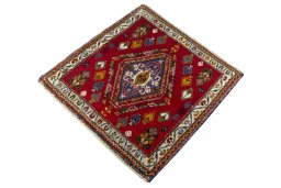 Corner detail of 2000s Shiraz rug showing border pattern and Wool pile