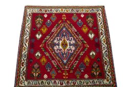 Surface texture of 2000s Shiraz rug with natural Wool and intricate pattern