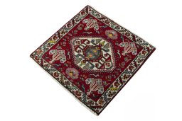 Corner detail of 2000s Shiraz rug showing border pattern and Wool pile