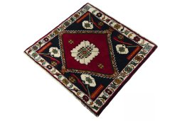 Corner detail of 2000s Shiraz rug showing border pattern and Wool pile