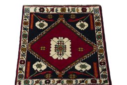 Surface texture of 2000s Shiraz rug with natural Wool and intricate pattern
