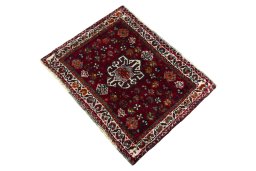 Corner detail of 2000s Shiraz rug showing border pattern and Wool pile