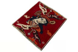 Corner detail of 2000s Shiraz rug showing border pattern and Wool pile