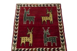 Surface texture of 2000s Shiraz rug with natural Wool and intricate pattern